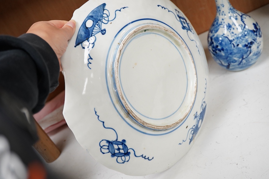 A Japanese Imari dish an Arita bottle vase together with a Chinese cloisonné enamel vase and a Chinese hardstone boulder carving, largest 34cm in diameter